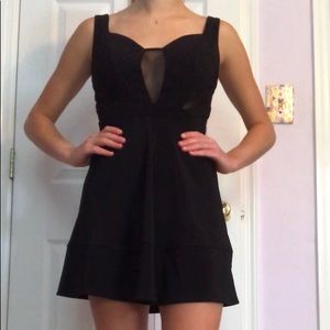 Little black dress with mesh cutouts